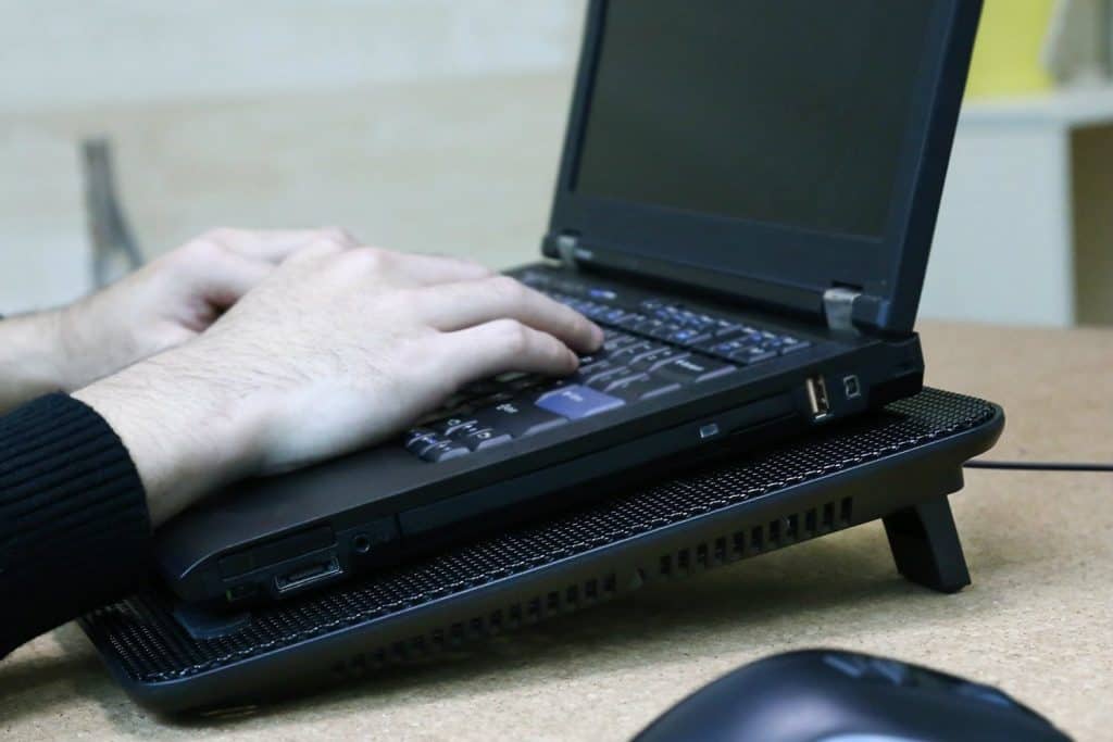 using a cooling pad for a laptop to fix overheating issues